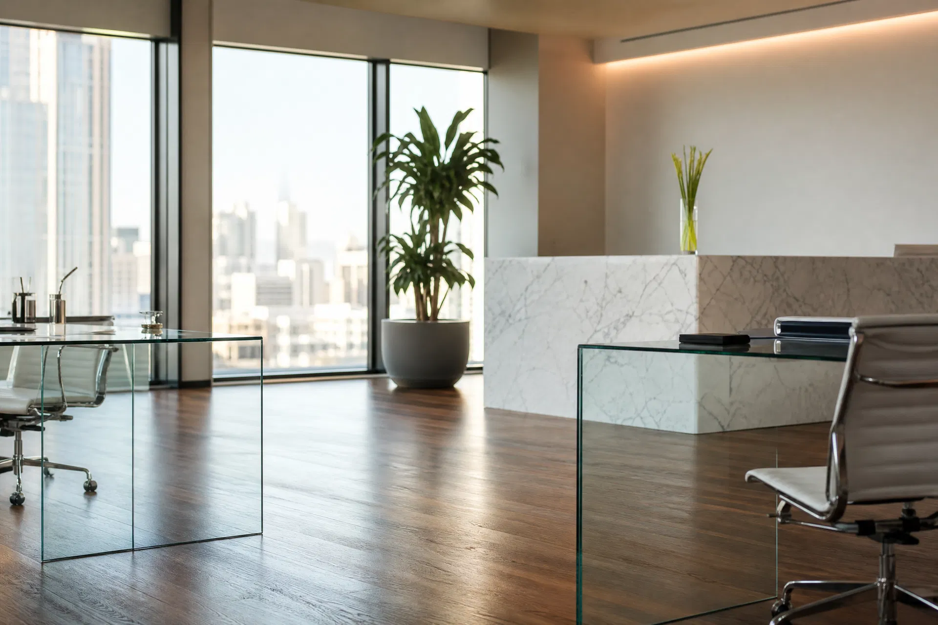 Pristine modern San Francisco office interior with glass desks and city skyline view